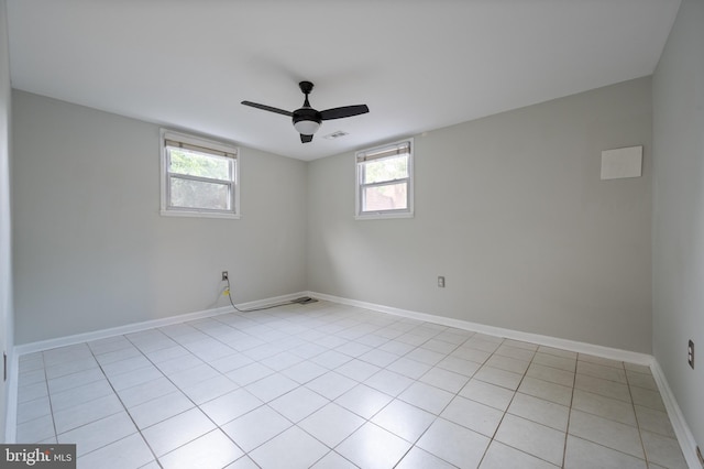 2413 Childs Ln, Alexandria, VA 22308 - spare room with plenty of natural light, ceiling fan, and light tile patterned flooring