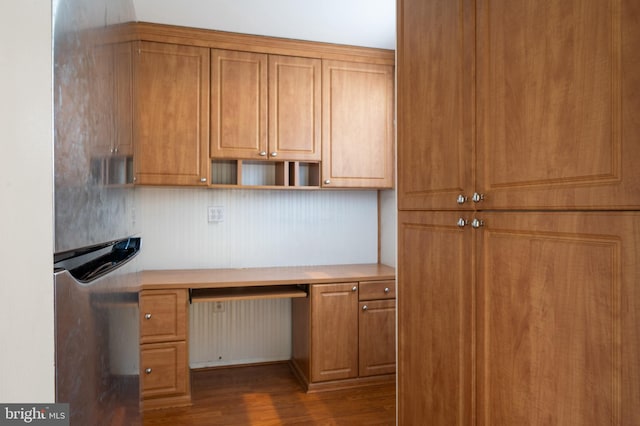 2413 Childs Ln, Alexandria, VA 22308 - unfurnished office featuring built in study area, wood finished floors, and radiator