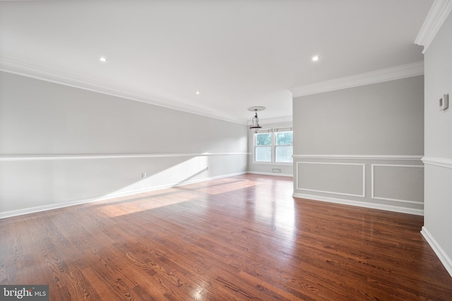 2413 Childs Ln, Alexandria, VA 22308 - spare room featuring ornamental molding, a chandelier, wood finished floors, and recessed lighting