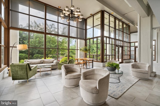 2429 Locust St Unit 217, Philadelphia, PA 19103 - common area featuring a high ceiling and floor to ceiling windows
