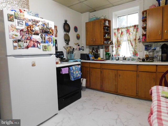 46-48 W Third St, Waynesboro, PA 17268 - kitchen with freestanding refrigerator, open shelves, black range with electric cooktop, a drop ceiling, and light countertops