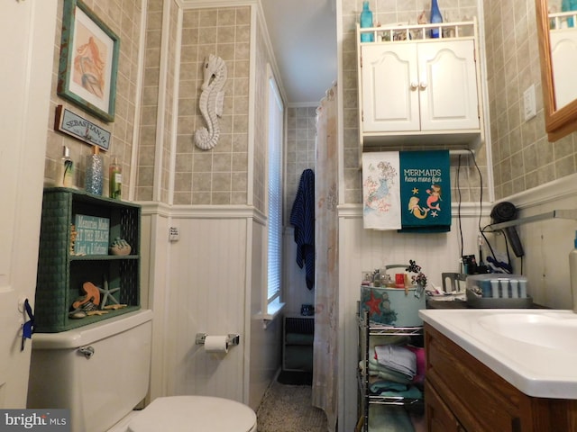 46-48 W Third St, Waynesboro, PA 17268 - full bath featuring vanity, tile walls, and ornamental molding