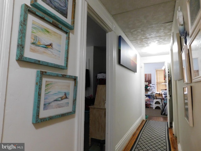 46-48 W Third St, Waynesboro, PA 17268 - hallway featuring wood finished floors and baseboards