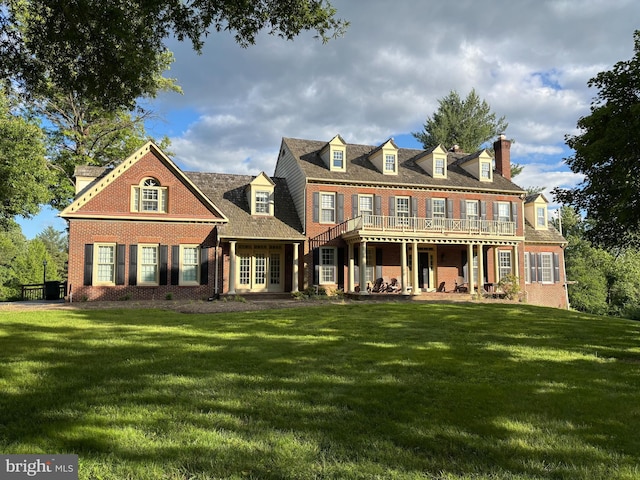 9140 Goshen Valley Dr, Gaithersburg, MD 20882 - view of front of property with a front lawn, brick siding, and a chimney