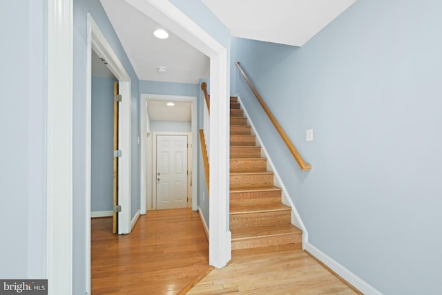 10728 Horde St, Silver Spring, MD 20902 - stairs featuring wood finished floors, baseboards, and recessed lighting