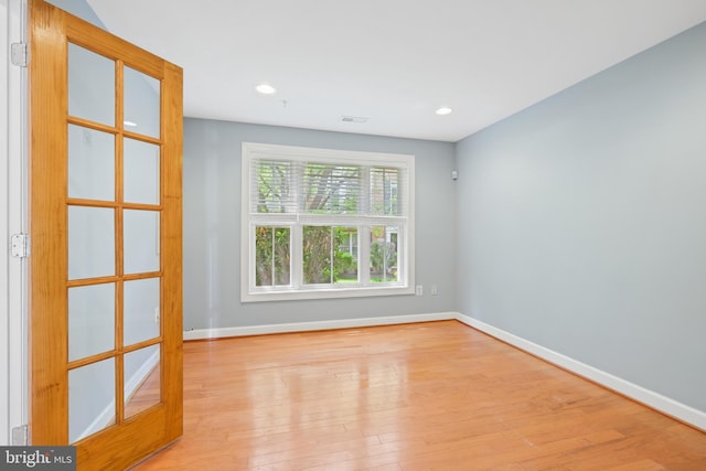 10728 Horde St, Silver Spring, MD 20902 - spare room with baseboards, light wood-style flooring, and recessed lighting