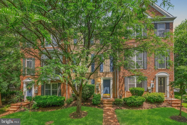 10728 Horde St, Silver Spring, MD 20902 - view of front facade with brick siding and a front yard