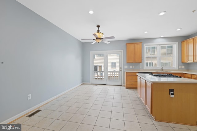 10728 Horde St, Silver Spring, MD 20902 - kitchen with light countertops, ceiling fan, baseboards, recessed lighting, and a sink