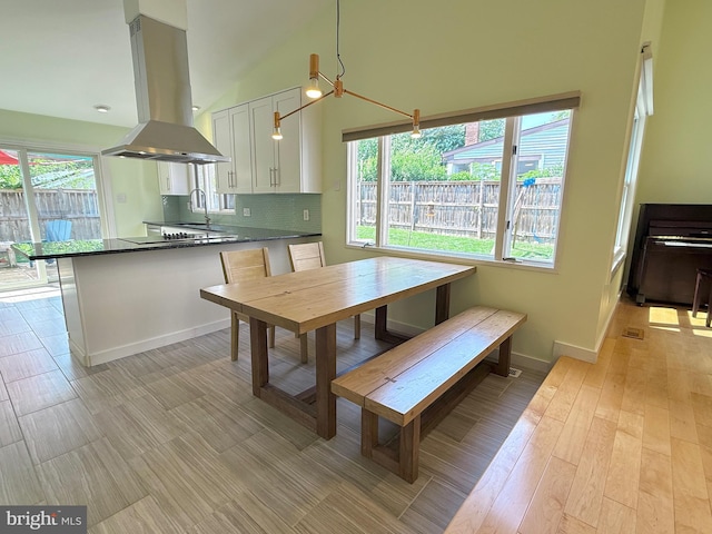 231 E Juniper Ave, Sterling, VA 20164 - dining area with plenty of natural light and a high ceiling