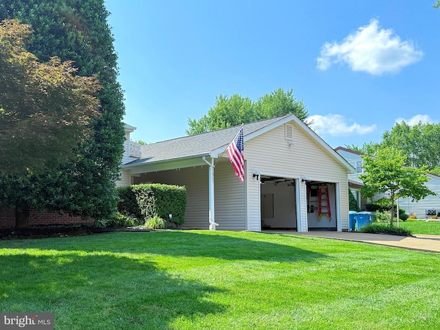 231 E Juniper Ave, Sterling, VA 20164 - view of front of house featuring a front yard and an attached garage