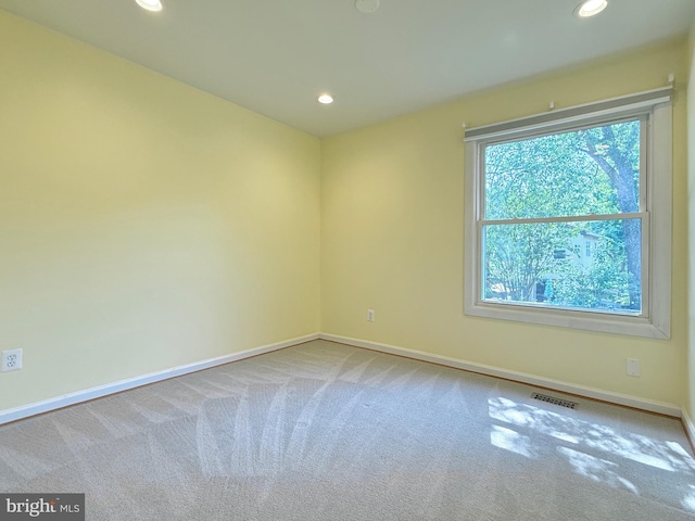 231 E Juniper Ave, Sterling, VA 20164 - carpeted spare room with baseboards and recessed lighting