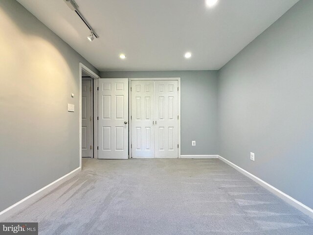 231 E Juniper Ave, Sterling, VA 20164 - unfurnished bedroom featuring carpet, recessed lighting, a closet, and track lighting