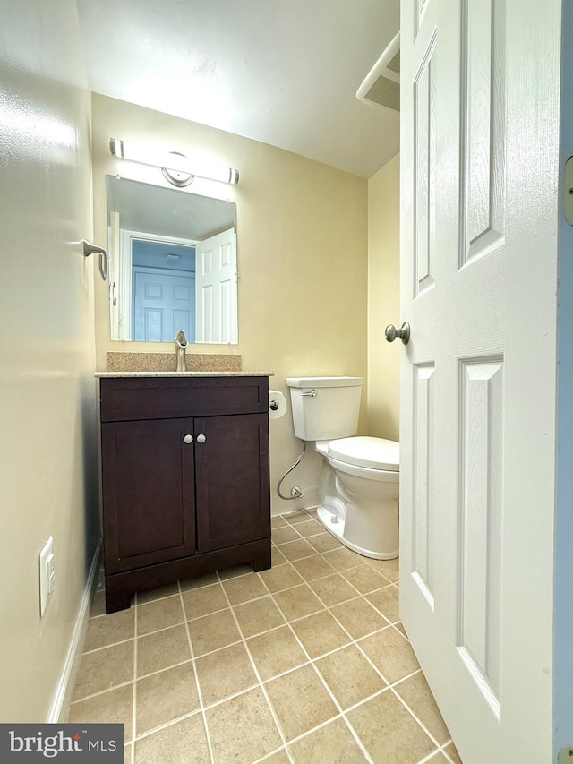 231 E Juniper Ave, Sterling, VA 20164 - half bath with tile patterned floors and vanity