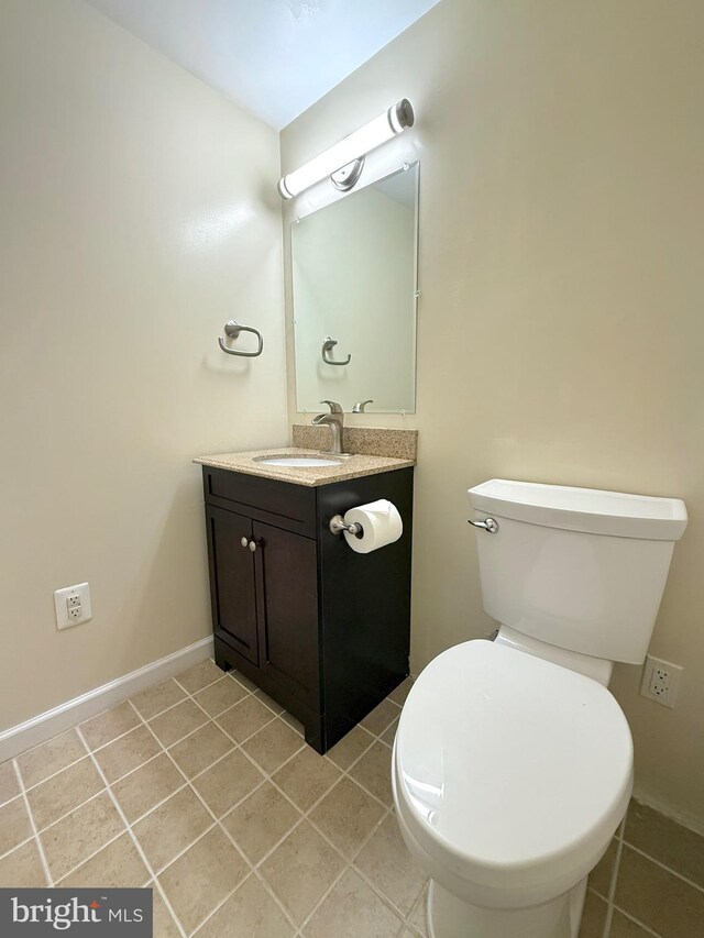 231 E Juniper Ave, Sterling, VA 20164 - bathroom with vanity and tile patterned floors