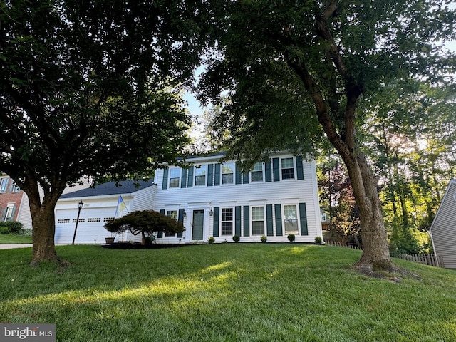 12562 Cricket Ln, Woodbridge, VA 22192 - colonial-style house featuring a front yard and a garage