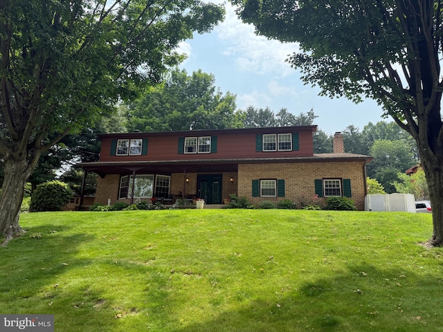 535 Maywood Rd, York, PA 17402 - view of front of home with brick siding and a chimney