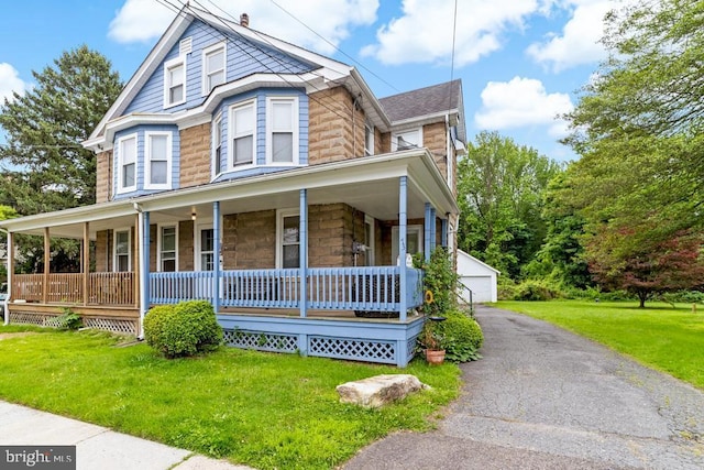 73 Fairfield Ave, Lawrence, NJ 08648 - view of front of home featuring a porch, stone siding, and a front lawn