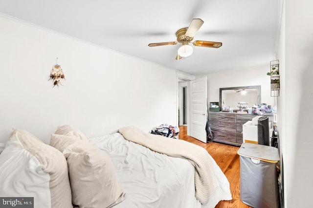 73 Fairfield Ave, Lawrence, NJ 08648 - bedroom with light wood-type flooring, a ceiling fan, and crown molding