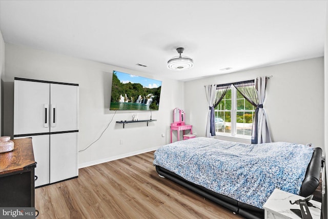 2569 N Independence Dr, Montross, VA 22520 - bedroom featuring light wood-style floors and baseboards