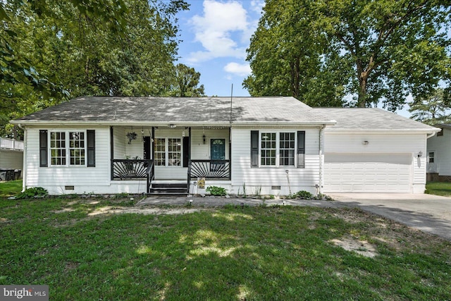 2569 N Independence Dr, Montross, VA 22520 - ranch-style house featuring a porch, crawl space, a garage, a front yard, and driveway