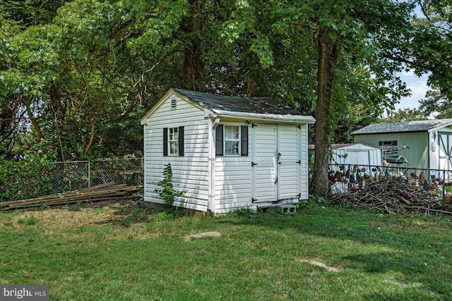 2569 N Independence Dr, Montross, VA 22520 - view of shed with a fenced backyard