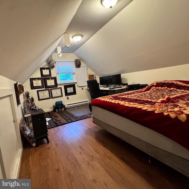 340 Pine Grove Rd, Gardners, PA 17324 - bedroom featuring wood finished floors, a baseboard radiator, and lofted ceiling