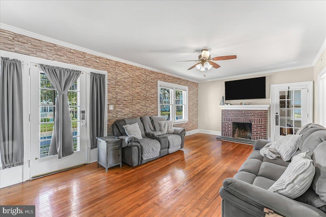 200 Winston Ave, Wilmington, DE 19804 - living area with a ceiling fan, hardwood / wood-style floors, a fireplace, and ornamental molding