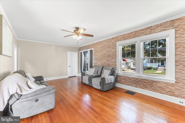 200 Winston Ave, Wilmington, DE 19804 - living room featuring ceiling fan, wood finished floors, and crown molding