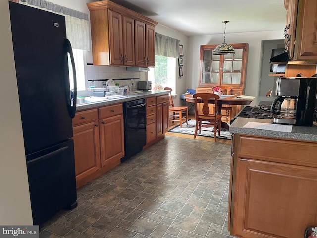 6936 Cedar Ave, Pennsauken, NJ 08109 - kitchen featuring black appliances, brown cabinets, tasteful backsplash, and dark stone finish floors
