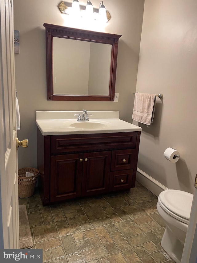 6936 Cedar Ave, Pennsauken, NJ 08109 - bathroom with vanity and stone finish flooring