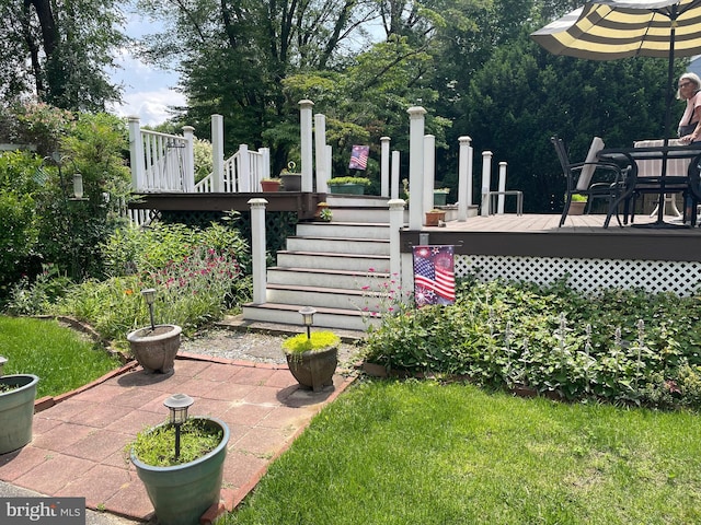 6936 Cedar Ave, Pennsauken, NJ 08109 - view of grassy yard featuring stairs and a deck