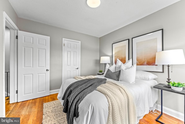 8450 Kavanagh Rd, Dundalk, MD 21222 - bedroom featuring light wood-type flooring