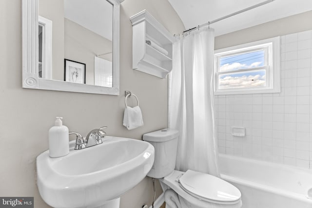 8450 Kavanagh Rd, Dundalk, MD 21222 - bathroom with a sink and shower / tub combo