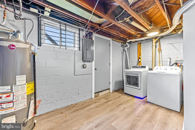 8450 Kavanagh Rd, Dundalk, MD 21222 - basement featuring water heater, electric panel, washer and clothes dryer, and wood finished floors