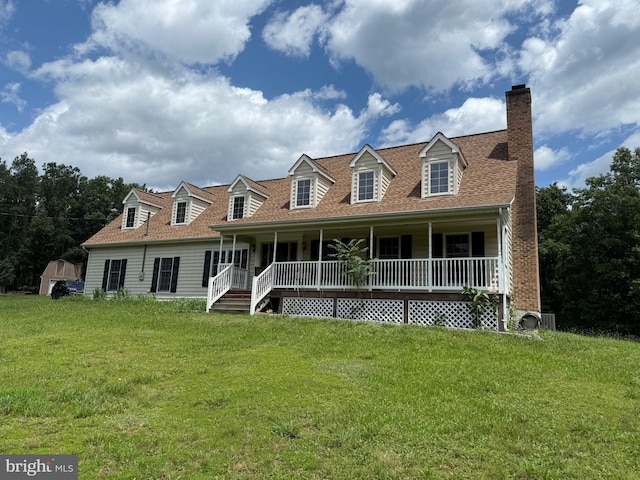 7519 N Frederick Pike, Cross Junction, VA 22625 - cape cod house featuring a porch, a front lawn, a chimney, and a shingled roof