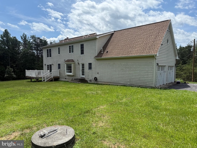 7519 N Frederick Pike, Cross Junction, VA 22625 - back of property with roof with shingles, a deck, a lawn, an attached garage, and driveway