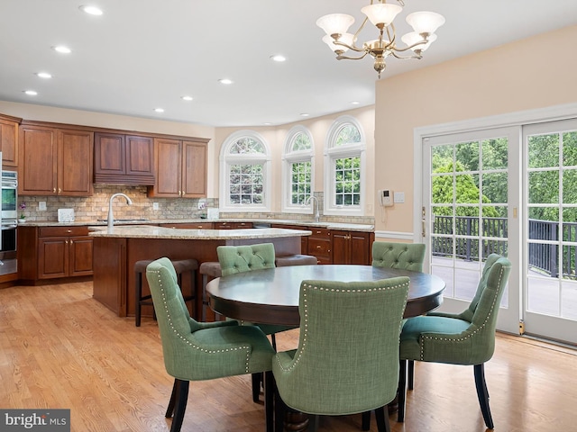 2 N Pheasants Rdg N, Wilmington, DE 19807 - dining room featuring a chandelier, recessed lighting, and light wood-style floors
