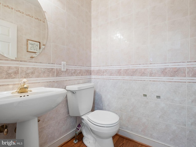 2 N Pheasants Rdg N, Wilmington, DE 19807 - half bathroom with toilet, wood finished floors, and tile walls