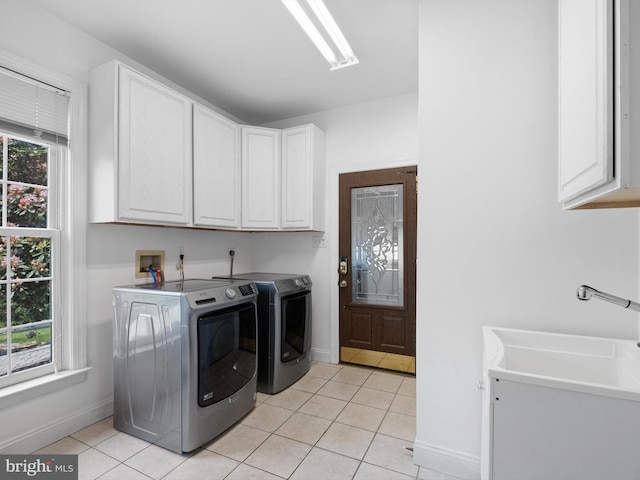2 N Pheasants Rdg N, Wilmington, DE 19807 - washroom with cabinet space, washing machine and clothes dryer, light tile patterned floors, and baseboards