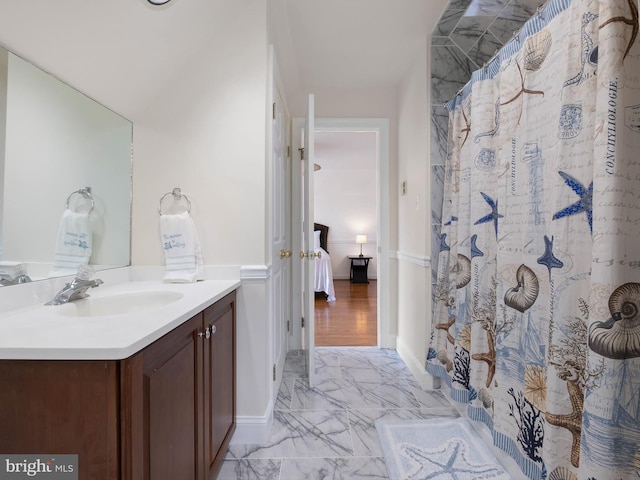 2 N Pheasants Rdg N, Wilmington, DE 19807 - full bath with vanity, marble finish floors, connected bathroom, and a shower with curtain