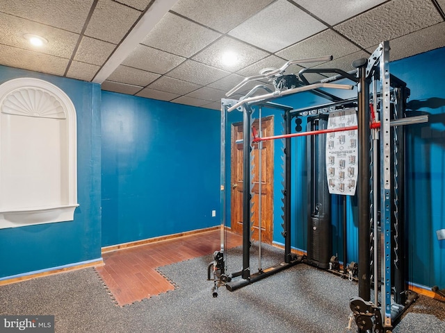 2 N Pheasants Rdg N, Wilmington, DE 19807 - workout area featuring baseboards, wood finished floors, and a paneled ceiling