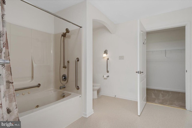 13336 Marquise Dr, Hagerstown, MD 21742 - bathroom featuring shower / tub combo, toilet, baseboards, and a spacious closet
