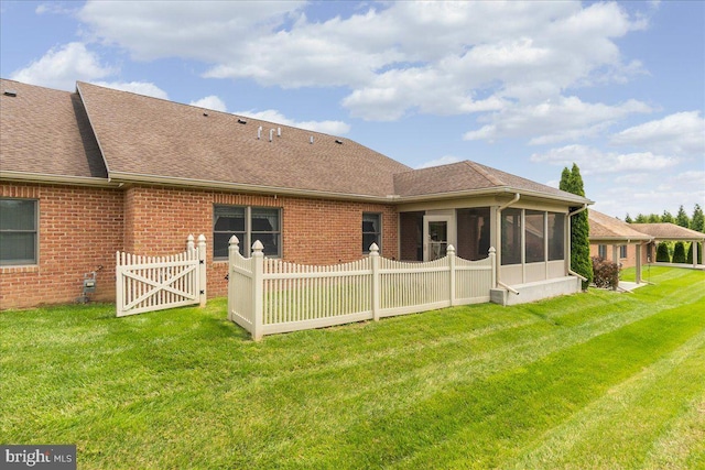 13336 Marquise Dr, Hagerstown, MD 21742 - rear view of property with a sunroom, roof with shingles, brick siding, and a gate