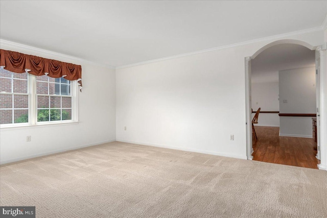 13336 Marquise Dr, Hagerstown, MD 21742 - spare room featuring ornamental molding, carpet floors, arched walkways, and baseboards