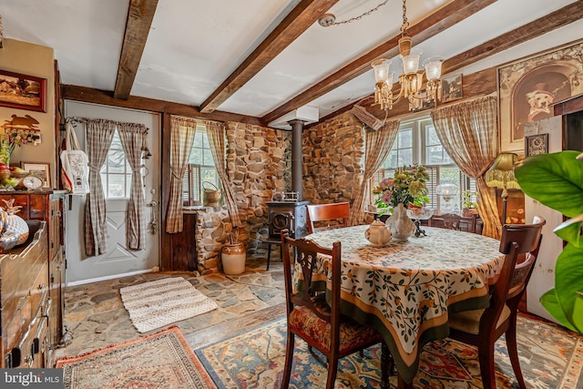 2355 Little Rd, Perkiomenville, PA 18074 - dining area with beam ceiling, a chandelier, a wood stove, and wood finished floors