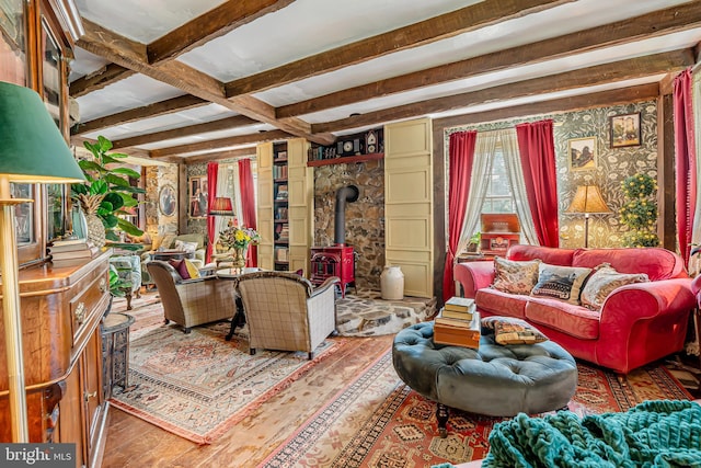 2355 Little Rd, Perkiomenville, PA 18074 - living area with a wood stove, beam ceiling, wood finished floors, and coffered ceiling