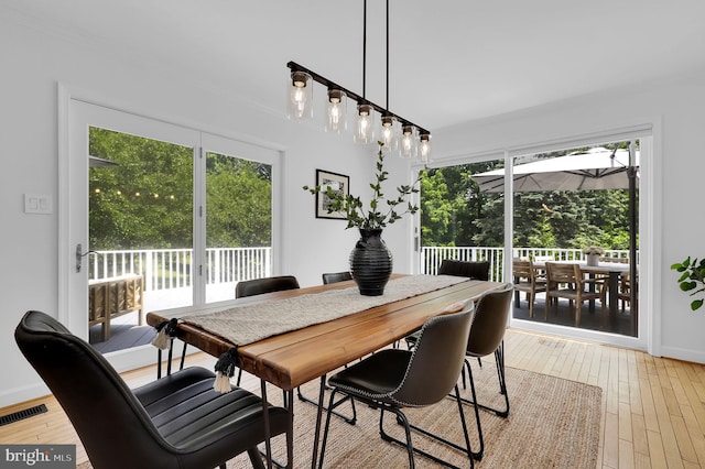 2725 Woodridge Ct, West Friendship, MD 21794 - dining room featuring light wood-type flooring and baseboards