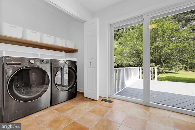 2725 Woodridge Ct, West Friendship, MD 21794 - washroom featuring washer and dryer and light tile patterned floors