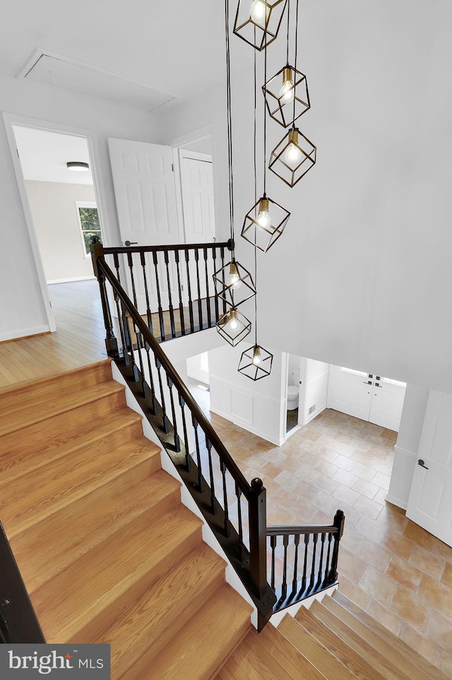 2725 Woodridge Ct, West Friendship, MD 21794 - stairway with attic access and baseboards