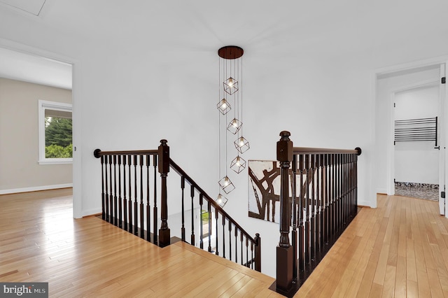 2725 Woodridge Ct, West Friendship, MD 21794 - staircase with wood-type flooring and baseboards